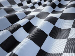 Detail šachovnicové vlajky – symbol konce závodní sezóny ve Formuli 1